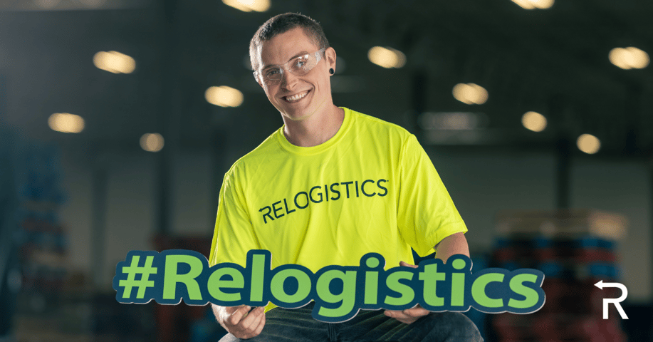 Relogistics team member holding sign