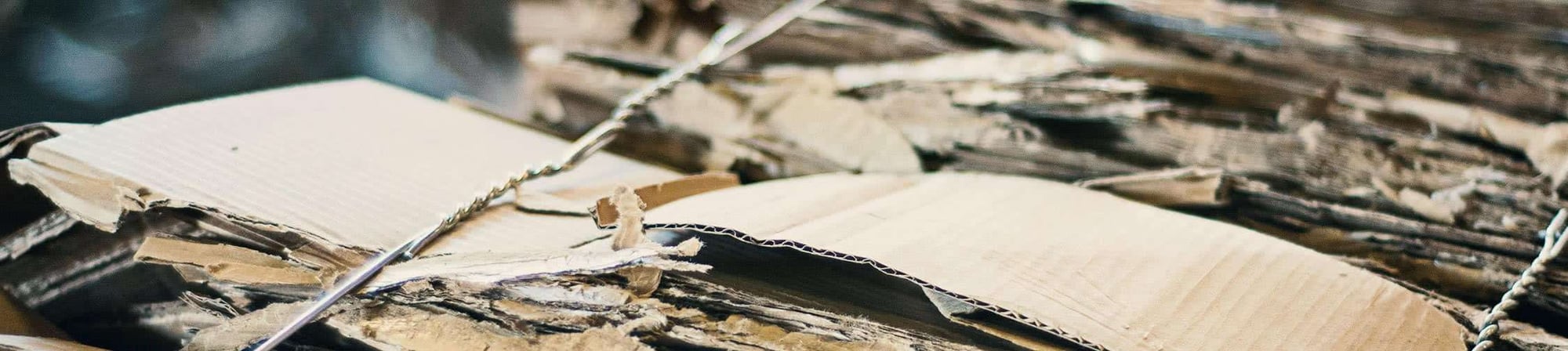 alt="Close-up of disassembled break pack boxes, emphasizing the importance of efficient handling in supply chain management and logistics."